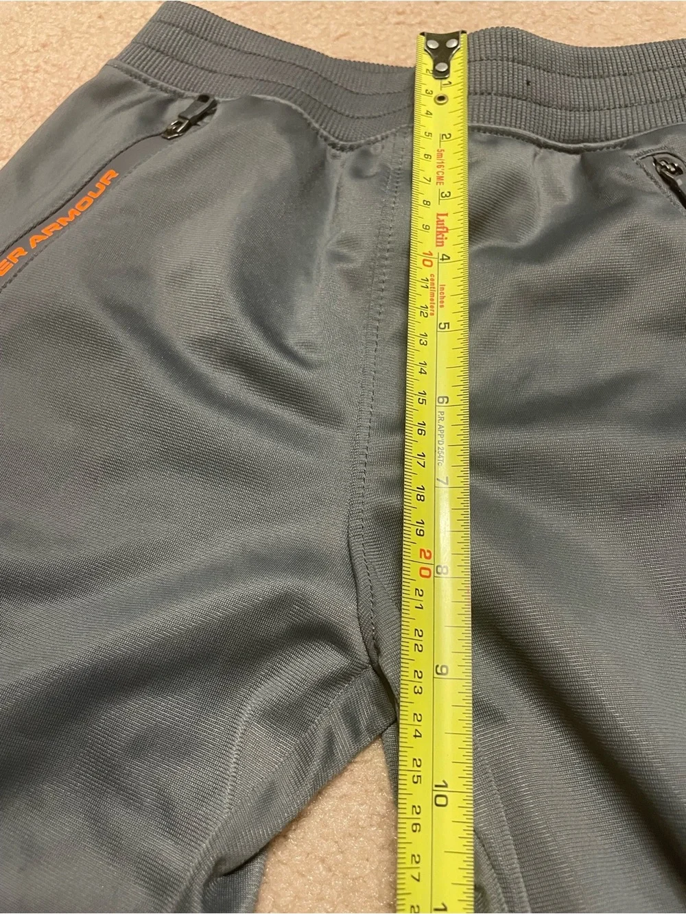 Under Armour Boys' Gray Jogger Pants with Orange Accents( size: 7)